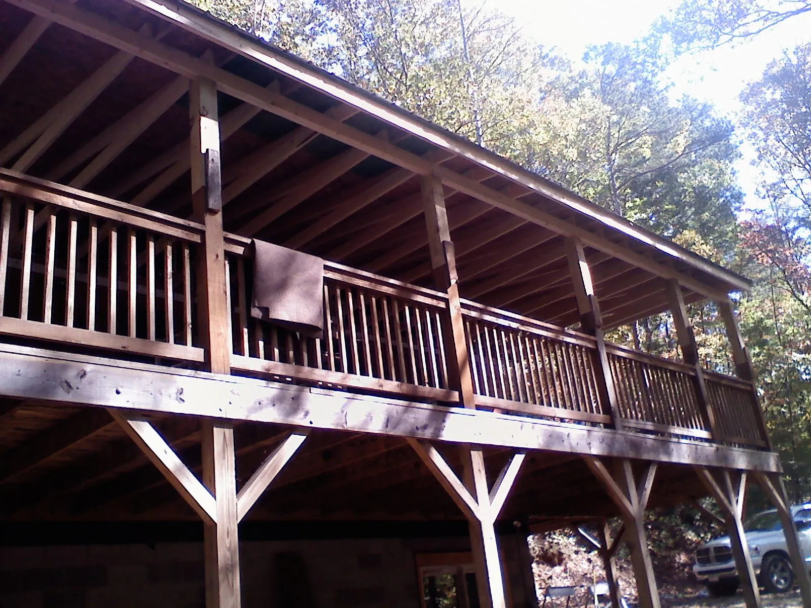 Timber framing under a new elevated porch and deck — Roof Leak Repair in North Richland Hills by Roofing Brothers